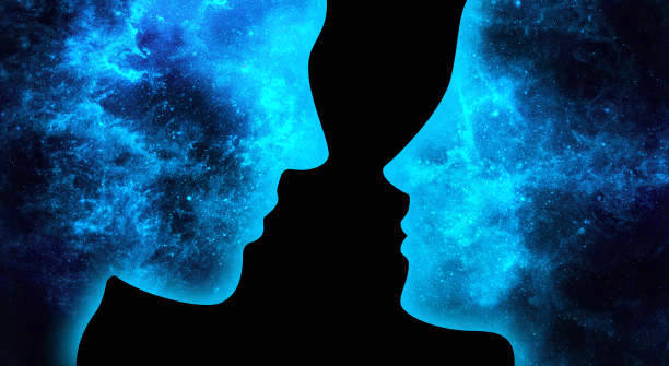 Blue space man and woman look at each other on a black background